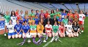 30 June 2008; At the TG4 All-Ireland Ladies Football Championship Launch were, back row, from left, Tara Hughes, Fermanagh, Rebecca Hallahan, Waterford, Angela Walsh, Cork, Denise Masterson, Dublin, Claire O'Hara, Mayo, Grainne Ní Fhlathachta, Mairead Morrisey, Tipperary, Maria Hoey, Galway, Michaela Downey, Down, Marie Devenny, Donegal, Irene Munnelly, Meath, Bernie Deegan, Laois, Aine Kinsella, Carlow, Maeve Moriarity, Armagh, and Gemma Begley, Tyrone. Midlle row, from left, Margaret Kelly, Wexford, Ailson Smith, Longford, Louise Tully, Roscommon, Michelle McElvanely, Longford, Geraldine Giles, Uachtaran Cumann Peil Gael na mBan, Bertie Ahern, T.D., Pól O'Gallchóir, Ceannasai, TG4, Sandra Malone, Clare, Meadhbh Nash, Limerick, Vicki McEnery, Westmeath and Andrea Murphy, Kilkenny. Front row, from left, Niamh Kindlon, Monaghan, Emer Miley, Wicklow, Aisling Doonan, Cavan, Patricia Stapleton, Offaly, Eimear Roantree, representing Antrim, Louise Glass, Derry, Niamh McMullan, representing London, Grace Lynch, Louth, Simone Gilabert, Kildare, and Martina Keane, Sligo. Croke Park, Dublin. Photo by Sportsfile