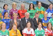 30 June 2008; Geraldine Giles, Uachtaran Cumann Peil Gael na mBan, Bertie Ahern, T.D., and Pol O'Gllchoir, Ceannasai, TG4, with players, back row, from left, Mairead Morrisey, Tipperary, Maria Hoey, Galway, Michaela Downey, Down, Marie Devenny, Donegal, Irene Munnelly, Meath, Bernie Deegan, Laois, middle row, Michelle McElvaney, Longford, left, and Sandra Malone, Clare, front row, from left, Patricia Stapleton, Offaly, Eimear Roantree, representing Antrim, Louise Glass, Derry, Niamh McMullan, representing London, and Grace Lynch, Louth, at the TG4 All-Ireland Ladies Football Championship Launch. Croke Park, Dublin. Picture credit: Stephen McCarthy / SPORTSFILE