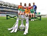 30 June 2008; Players representing counties involved in the TG4 All-Ireland Ladies Junior Championship with the West County Hotel cup, back row, from left, Aine Kinsella, Carlow, Louise Glass, Derry, Grace Lynch, Louth, and Emer Miley, Wicklow. Front row, from left, Patricia Stapleton, Offaly, Eimear Roantree, representing Antrim, and Niamh McMullen, representing London, at the TG4 All-Ireland Ladies Football Championship Launch. Croke Park, Dublin. Picture credit: Stephen McCarthy / SPORTSFILE