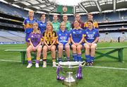 30 June 2008; Players representing counties involved in the TG4 All-Ireland Ladies Intermediate Championship with the Mary Quinn Memiorial cup, back row, from left, Sandra Malone, Clare, Aisling Doonan, Cavan, Meadhbh Nash, Limerick, Vicki McEnery, representing Westmeath, and Louise Tuly, Roscommon. Front row, from left, Margaret Kelly, Wexford, Andrea Murphy, Kilkenny, Alison Smith and Michelle McElvaney, Longford, and Mairean Morrisey, Tipperary, at the TG4 All-Ireland Ladies Football Championship Launch. Croke Park, Dublin. Picture credit: Stephen McCarthy / SPORTSFILE