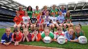 30 June 2008; At the TG4 All-Ireland Ladies Football Championship Launch were back row, from left, Michaela Downey, Down, Marie Devenny, Donegal, Grainne Ni Fhlathachta, Kerry, Maria Hoey, Galway, Irene Munnelly, Meath and Bernie Deegan, Laois. Middle row, from left, Maeve Moriarity, Armagh, Gemma Begley, Tyrone, Martina Keane, Sligo, Angela Walsh, Cork, Niamh Kindlon, Monaghan, Simone Gilabert, Kildare, Denise Masterson, Dublin and Claire O'Hara, Mayo. Front row, from left, Ellen Darcy, representing Laois, Amy O'Driscoll, representing Cork, Chloe Byrne, representing Galway, Niamh Downes, representing Armagh, Lesley Carroll, representing Kerry, Louise Whelan, representing Tyrone, Aoife Dillon, representing Dublin and Jessica Lynch, representing Mayo. Croke Park, Dublin. Picture credit: Paul Mohan / SPORTSFILE