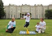 2 July 2008; Caoimhe May, Age 5, on a jump mat watched by former Olympic Runner Catherina McKiernan with her son Patrick, Age 2, and Irish 3000m runner Roisin McGettigan at the Launch of Athletics Ireland Family Fitness Festival. Farmleigh, Phoenix Park, Dublin. For more information visit www.familyfitnessfestival.ie. Picture credit: Matt Browne / SPORTSFILE