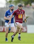 24 May 2015; Aonghus Clarke, Westmeath, in action against Stephen Maher, Laois. Leinster GAA Hurling Senior Championship Qualifier Group, Round 3, Laois v Westmeath. O'Moore Park, Portlaoise, Co. Laois. Picture credit: Brendan Moran / SPORTSFILE