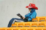 6 July 2008; A young Cork supporter reads his match programme before the game. GAA Football Munster Senior Championship Final, Kerry v Cork, Pairc Ui Chaoimh, Cork. Picture credit: Brendan Moran / SPORTSFILE