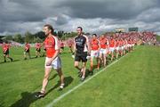 29 June 2008; Paul McGrane, Armagh captain leads the Armagh team before the start of the match. GAA Football Ulster Senior Championship Semi-Final, Down v Armagh, St Tighearnach's Park, Clones, Co. Monaghan. Picture credit: David Maher / SPORTSFILE
