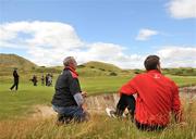 8 July 2008; Spectators keep an eye on Padraig Harrington's shot to the 12th green during the Ladbrokes.com Irish PGA Championship Pro Am Day. The European Club, Co. Wicklow. Picture credit: Brian Lawless / SPORTSFILE