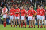 6 July 2008; Members of the Cork team stand together for the national anthem before the game. GAA Football Munster Senior Championship Final, Kerry v Cork, Pairc Ui Chaoimh, Cork. Picture credit: Brendan Moran / SPORTSFILE