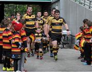25 April 2015; Young Munster enter the field, lead by their mascot Scott Allen, aged 4, Janesboro, Co. Limerick. Ulster Bank League, Division 1A, Semi-Final, Lansdowne v Young Munster. Aviva Stadium, Lansdowne Road, Dublin.  Picture credit: Sam Barnes / SPORTSFILE