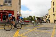 22 May 2015; The leading group, led by Sean MacKinnon, left, CANADA National Team, and Jeremy Durrin, second from left, Neon Velo Cycling Team, races through Manorhamilton, Co. Leitrim, during Stage 6 of the 2015 An Post Rás. Ballina - Ballinamore. Photo by Sportsfile