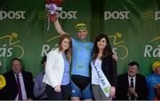 22 May 2015; Ian Richardson, UCD, after receiving the The One Direct County Jersey from Miss An Post Sinead Flynn and Averil Tyrrell, Marketing Executive, One Direct, following Stage 6 of the 2015 An Post Rás. Ballina - Ballinamore. Photo by Sportsfile