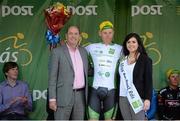 22 May 2015; Ryan Mullen, An Post Chain Reaction after receiving the The Irish Sports Council U23 White Jersey Classification from Miss An Post Sinead Flynn and Enda Stenson, chairperson Leitrim Sports Partnership, following Stage 6 of the 2015 An Post Rás. Ballina - Ballinamore. Photo by Sportsfile