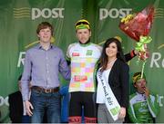 22 May 2015; Robert Partridge after receiving the One4All Bikes4Work King of the Mountains Jersey Classification from Miss An Post Sinead Flynn and Tadgh Moran, Moran Cycles, following Stage 6 of the 2015 An Post Rás. Ballina - Ballinamore. Photo by Sportsfile