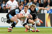 22 May 2015; Paddy Jackson, Ulster, is tackled by Stuart Hogg, left, and Jonny Gray, Glasgow Warriors. Guinness PRO12 Play-Off, Glasgow Warriors v Ulster, Scotstoun Stadium, Glasgow, Scotland. Picture credit: Craig Williamson / SPORTSFILE