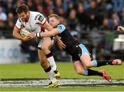 22 May 2015; Jared Payne, Ulster, is tackled by Finn Russel, Glasgow Warriors. Guinness PRO12 Play-Off, Glasgow Warriors v Ulster, Scotstoun Stadium, Glasgow, Scotland. Picture credit: Craig Williamson / SPORTSFILE
