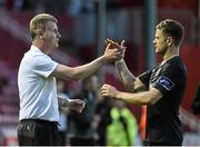22 May 2015; Dundalk manager Stephen Kenny celebrates with Dane Massey at the end of the game. SSE Airtricity League Premier Division, St Patrick's Athletic v Dundalk, Richmond Park, Dublin. Picture credit: David Maher / SPORTSFILE