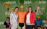 23 May 2015; Andreas Mueller, Hrinkow Advarics Cycling, after receiving The LeasePlan Stage Jersey from Miss An Post Rás Niamh Bidwell and Carolyn Dowdall, Head of State Services LeasePlan, following Stage 7 of the 2015 An Post Rás. Ballinamore - Drogheda. Photo by Sportsfile