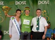 23 May 2015; Aaron Gate, An Post Chain reaction, after receiving the Post Office Sprint Jersey Classification from Miss An Post Rás Niamh Bidwell and Martin Everitt, Post Office Clerk, Drogheda Post Office, following Stage 7 of the 2015 An Post Rás. Ballinamore - Drogheda. Photo by Sportsfile