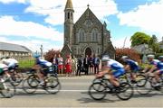24 May 2015; A general view of the peloton as it races through Curragha, Co. Meath, during Stage 8 of the 2015 An Post Rás. Drogheda - Skerries. Photo by Sportsfile
