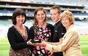 8 July 2008; Donegal's Nora Stapleton accompanied by her mother Siobhan, her brother Michael and her grandmother Iris Grant after she was presented with the Irish Independent / Lucozade Sport Ladies Player of the Month Award for June. Croke Park, Dublin. Picture credit: Ray McManus / SPORTSFILE