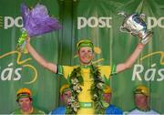 24 May 2015; Lukas Postlberger, Tirol Cycling Team, celebrates on stage after he retained the yellow jersey following Stage 8 of the 2015 An Post Rás. Drogheda - Skerries. Photo by Sportsfile