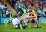 24 May 2015; Richie McCarthy, Limerick, in action against Shane O'Donnell, Clare. Munster GAA Hurling Senior Championship Quarter-Final, Clare v Limerick. Semple Stadium, Thurles, Co. Tipperary. Picture credit: Dáire Brennan / SPORTSFILE