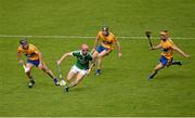24 May 2015; Paudie O'Brien, Limerick, in action against Clare players, left to right, Gearóid O'Connell, Patrick Donnellan, and John Conlon. Munster GAA Hurling Senior Championship Quarter-Final, Clare v Limerick. Semple Stadium, Thurles, Co. Tipperary. Picture credit: Dáire Brennan / SPORTSFILE