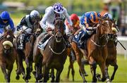 24 May 2015; Pleascach, centre, with Kevin Manning up, on their way to winning the Tattersalls Irish 1,000 Guineas. Curragh Racecourse, The Curragh, Co. Kildare. Picture credit: Cody Glenn / SPORTSFILE