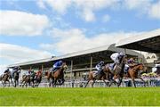 24 May 2015; In what was a photo finish, Pleascach, 11, with Kevin Manning up, ahead of Found, right, with Ryan Moore up, on their way to winning the Tattersalls Irish 1,000 Guineas. Curragh Racecourse, The Curragh, Co. Kildare. Picture credit: Cody Glenn / SPORTSFILE