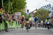 24 May 2015; Aidis Kruopis, An Post Chain Reaction, celebrates as he crosses the line to win Stage 8 of the 2015 An Post Rás. Drogheda - Skerries. Photo by Sportsfile