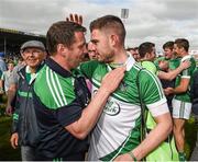24 May 2015; The Limerick goalkeeper Barry Hennessy celebrates with strength and conditioning coach Mick Lyons after the game. Munster GAA Hurling Senior Championship Quarter-Final, Clare v Limerick. Semple Stadium, Thurles, Co. Tipperary. Picture credit: Ray McManus / SPORTSFILE