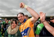 24 May 2015; Limerick's Paudie O'Brien, wearing a Clare jersey, celebrates with Limerick supporters after the game. Munster GAA Hurling Senior Championship Quarter-Final, Clare v Limerick. Semple Stadium, Thurles, Co. Tipperary. Picture credit: Ray McManus / SPORTSFILE