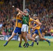 24 May 2015; Gavin O'Mahony, Limerick, in action against John Conlon, Clare. Munster GAA Hurling Senior Championship Quarter-Final, Clare v Limerick. Semple Stadium, Thurles, Co. Tipperary. Picture credit: Ray McManus / SPORTSFILE