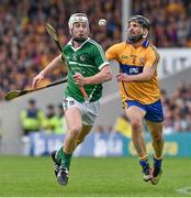 24 May 2015; Cian Lynch, Limerick, in action against Domhnall O'Donovan, Clare. Munster GAA Hurling Senior Championship Quarter-Final, Clare v Limerick. Semple Stadium, Thurles, Co. Tipperary. Picture credit: Ray McManus / SPORTSFILE