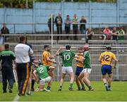 24 May 2015; Clare and Limerick players tussel with each other moments before half time. Referee Colm Lyons issued a red card to Patrick Donnellan shortly after and the Limerick captain Donal O'Grady, 10, was treated for an injury to the face. Munster GAA Hurling Senior Championship Quarter-Final, Clare v Limerick. Semple Stadium, Thurles, Co. Tipperary.  Picture credit: Ray McManus / SPORTSFILE