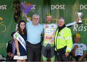 24 May 2015; Aidis Kruopis, An Post Chain Reaction, after receiving the One4All Bikes4Work King of the Mountains Jersey Classification and the Brendan Carroll trophy, from Miss An Post Rás Aisling Halpin, Jack Jordan, Group Sales Director, One4All, and Pat O'Shaughnessy, right following Stage 8 of the 2015 An Post Rás. Drogheda - Skerries. Photo by Sportsfile