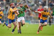 24 May 2015; Cathal O'Neill, Scoil Iósaf, Adare, Limerick , in action against Liam Murphy, left, St Aidan's, Clare, and Sean McNamara, St Conaires NS, Clare, during the half time Primary Go Games. Munster GAA Hurling Senior Championship Quarter-Final, Clare v Limerick. Semple Stadium, Thurles, Co. Tipperary. Picture credit: Ray McManus / SPORTSFILE