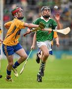 24 May 2015; Cathal O'Neill, Scoil Iósaf, Adare, Limerick , in action against Liam Murphy, St Aidan's, Clare, during the half time Primary Go Games. Munster GAA Hurling Senior Championship Quarter-Final, Clare v Limerick. Semple Stadium, Thurles, Co. Tipperary. Picture credit: Ray McManus / SPORTSFILE