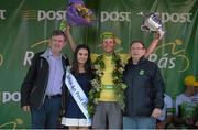 24 May 2015; Lukas Postlberger, Tirol Cycling Team, after receiving the An Post Rás Yellow Jersey Classification and the George Plant trophy following Stage 8 from Miss An Post Rás Aisling Halpin, Donal Connell, left, CEO, An Post, and Race Director Tony Campbell, following Stage 8 of the 2015 An Post Rás. Drogheda - Skerries. Photo by Sportsfile