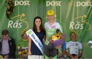 24 May 2015; Second place overall, Joshua Edmondson, An Post Chain Reaction, with Miss An Post Rás Aisling Halpin following Stage 8 of the 2015 An Post Rás. Drogheda - Skerries. Photo by Sportsfile
