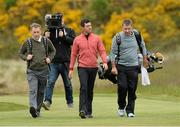25 May 2015; Rory McIlroy with his coach Michael Bannon, left, and caddie JP Fitzgerald, right, during a practice round. Dubai Duty Free Irish Open Golf Championship 2015, Practice Day 1. Royal County Down Golf Club, Co. Down. Picture credit: Oliver McVeigh / SPORTSFILE