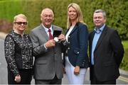 25 May 2015; Forty years after his widely acclaimed victory in the revamped Irish Open Championship at Woodbrook in 1975, Christy O’Connor Jnr was today honoured by the Association of Sports Journalists in Ireland for his outstanding contribution to professional golf in this country. Pictured is Christy O’Connor Jnr, second left, with, from left, wife Ann, daughter Ann Jnr and son Nigel. Croke Park Hotel, Dublin. Picture credit: Ramsey Cardy / SPORTSFILE
