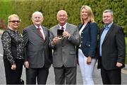 25 May 2015; Forty years after his widely acclaimed victory in the revamped Irish Open Championship at Woodbrook in 1975, Christy O’Connor Jnr was today honoured by the Association of Sports Journalists in Ireland for his outstanding contribution to professional golf in this country. Pictured is Christy O’Connor Jnr, centre, with, from left, wife Ann, broadcaster and journalist Jimmy 'The Memory Man' Magee, daughter Ann Jnr and son Nigel and Peter Byrne, President of the Association of Sports Journalists Ireland. Croke Park Hotel, Dublin. Picture credit: Ramsey Cardy / SPORTSFILE