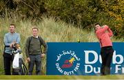 25 May 2015; Rory McIlroy plays a shot on the 17th tee watched by caddie JP Fitzgerald, left, and coach Michael Bannon, centre, during a practice round. Dubai Duty Free Irish Open Golf Championship 2015, Practice Day 1. Royal County Down Golf Club, Co. Down. Picture credit: Oliver McVeigh / SPORTSFILE