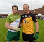 25 May 2015; Captains Enda Murphy, left, Rest of Ireland and Brendan Coulter, Ulster XV, before the game. The GAA Open Charity Football match aims to raise funds for the Cancer Fund for Children at Daisy’s Lodge in Newcastle, the setting for the Dubai Duty Free Irish Open Golf at the Royal County Down course. The GAA Open is a partnership event between the GAA at club, county, provincial and national level, the Newry, Mourne and Down District Council and the Dubai Duty Free Irish Open. St Patrick's Park, Newcastle, Co. Down.GAA Open Charity Football Match, Ulster v Rest of Ireland, St Patrick's Park, Newcastle, Co. Down. Picture credit: Oliver McVeigh / SPORTSFILE