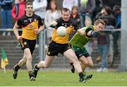 25 May 2015; Dan McCartan, Ulster XV, in action against Tomas Quinn, Rest of Ireland. The GAA Open Charity Football match aims to raise funds for the Cancer Fund for Children at Daisy’s Lodge in Newcastle, the setting for the Dubai Duty Free Irish Open Golf at the Royal County Down course. The GAA Open is a partnership event between the GAA at club, county, provincial and national level, the Newry, Mourne and Down District Council and the Dubai Duty Free Irish Open. St Patrick's Park, Newcastle, Co. Down.GAA Open Charity Football Match, Ulster v Rest of Ireland, St Patrick's Park, Newcastle, Co. Down. Picture credit: Oliver McVeigh / SPORTSFILE