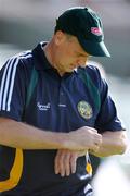 12 July 2008; Offaly manager Joe Dooley check the time at the start of the game. GAA Hurling All-Ireland Senior Championship Qualifier, Round 3, Limerick v Offaly, Gaelic Grounds, Limerick. Picture credit: Ray McManus / SPORTSFILE