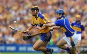 13 July 2008; Tony Griffin, Clare, in action against Conor O'Brien, Tipperary. GAA Hurling Munster Senior Championship Final, Tipperary v Clare, Gaelic Grounds, Limerick. Picture credit: Pat Murphy / SPORTSFILE