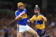 13 July 2008; Eamonn Corcoran, Tipperary, in action against Tony Griffin, Clare. GAA Hurling Munster Senior Championship Final, Tipperary v Clare, Gaelic Grounds, Limerick. Picture credit: Pat Murphy / SPORTSFILE