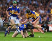 13 July 2008; Eamonn Buckley, Tipperary, in action against Niall Gilligan, Clare. GAA Hurling Munster Senior Championship Final, Tipperary v Clare, Gaelic Grounds, Limerick. Picture credit: Pat Murphy / SPORTSFILE
