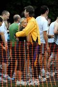 12 July 2008; Two competitors keep warm before the start of the Lifestyle Sports - Adidas Irish Runner Challenge. Phoenix Park, Dublin. Picture credit: Ray McManus / SPORTSFILE